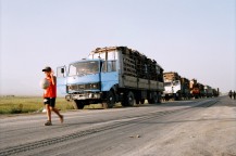 Gulnara Kasmalieva & Muratbek Djumaliev
Boy and truck caravan 
2006, c-print 53 x 80 cm, Courtesy Laura Bulian Gallery, Milano